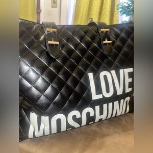 MOSCHINO TOTE! Wear n tear on corners. Please see photos. Comes with dust bag.